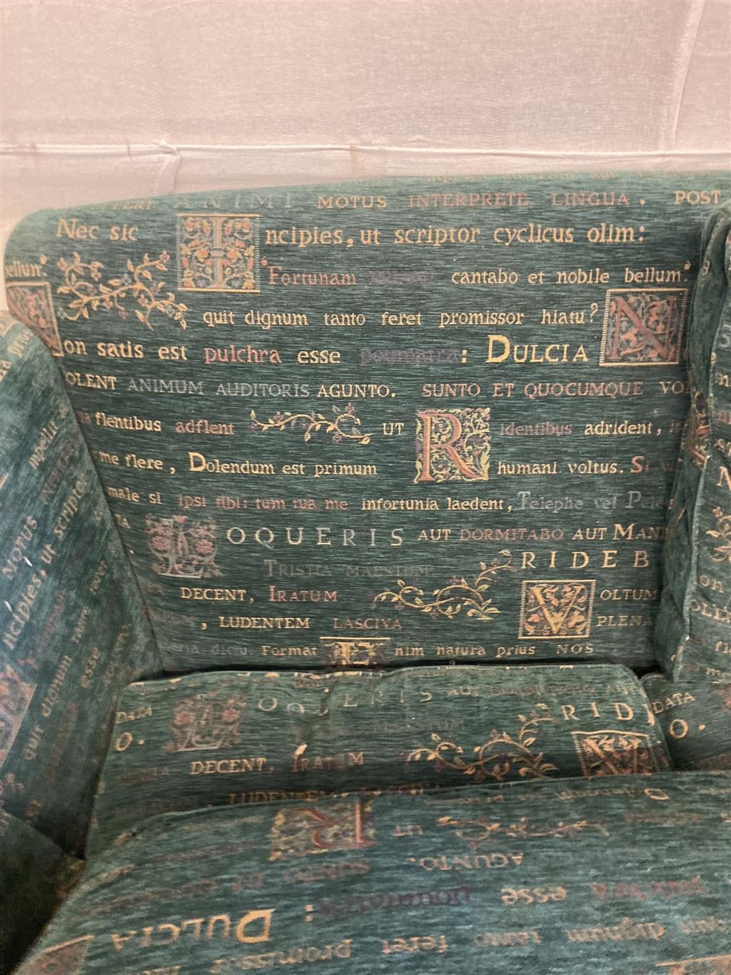 A modern contemporary upholstered two seater sofa upholstered in patterned green fabric, length 178cm, depth 97cm, height 78cm